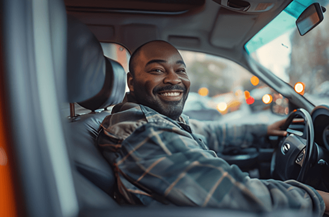 Happy driver in car